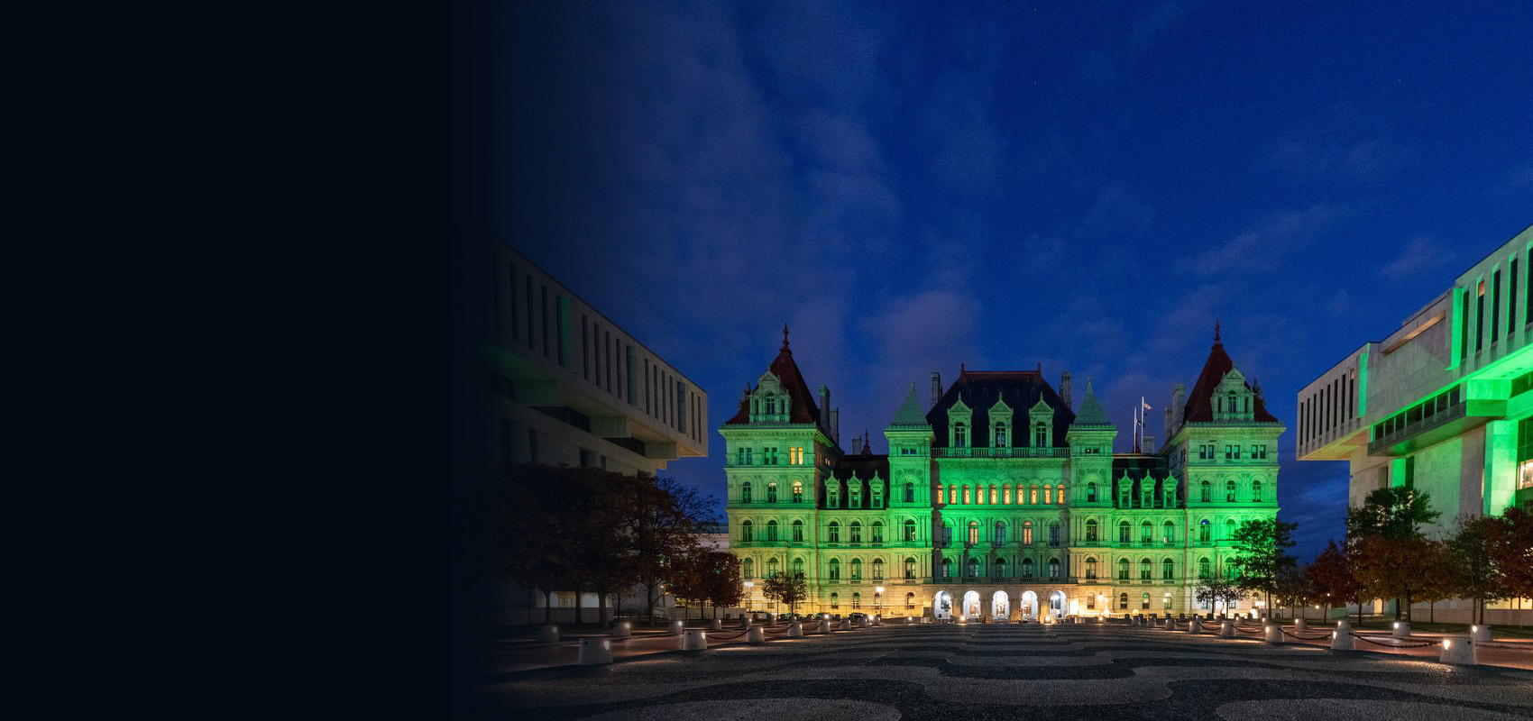 The New York State Capitol in Albany, NY, is illuminated green to mark the start of Mental Health Awareness Month in New York State