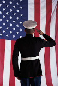 Marine saulting the US flag